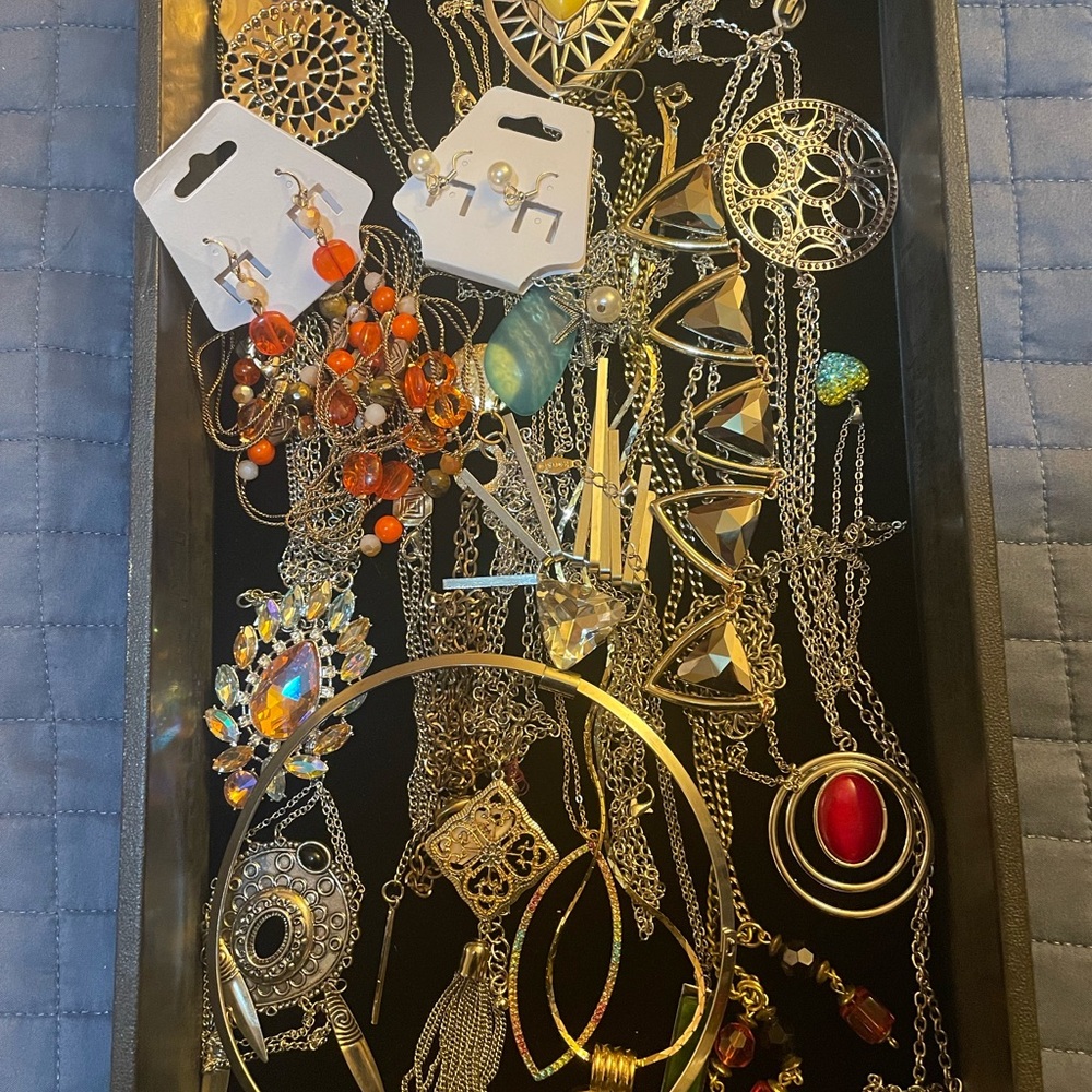 20 Assorted Silver and Gold-tone necklaces.  All wearable and sellable.